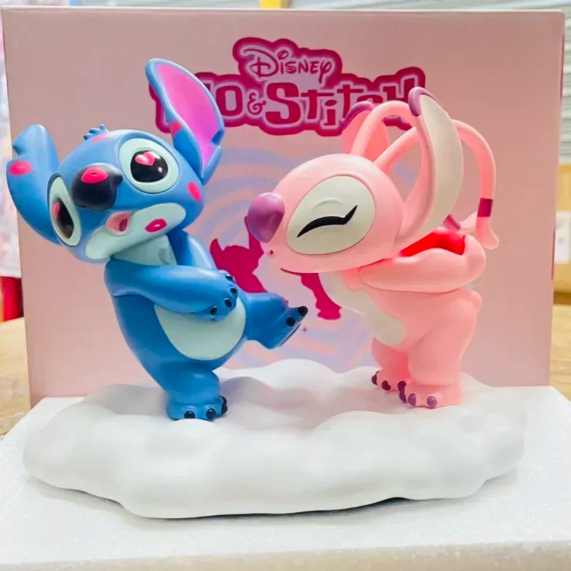 Stitch and Angel love figurines