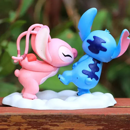 Stitch and Angel love figurines